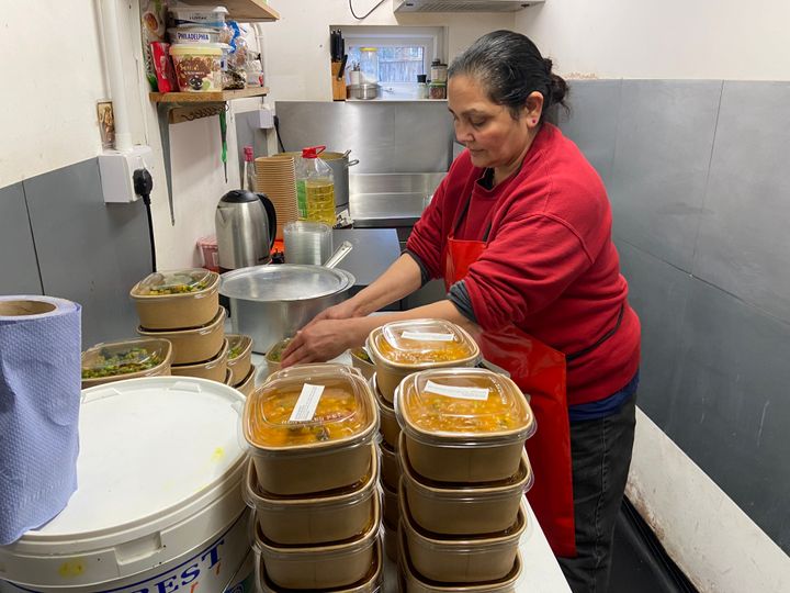 Anju Patel preparing dishes for customers