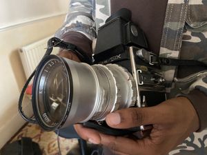 Tex's Nephew Holding a Camera